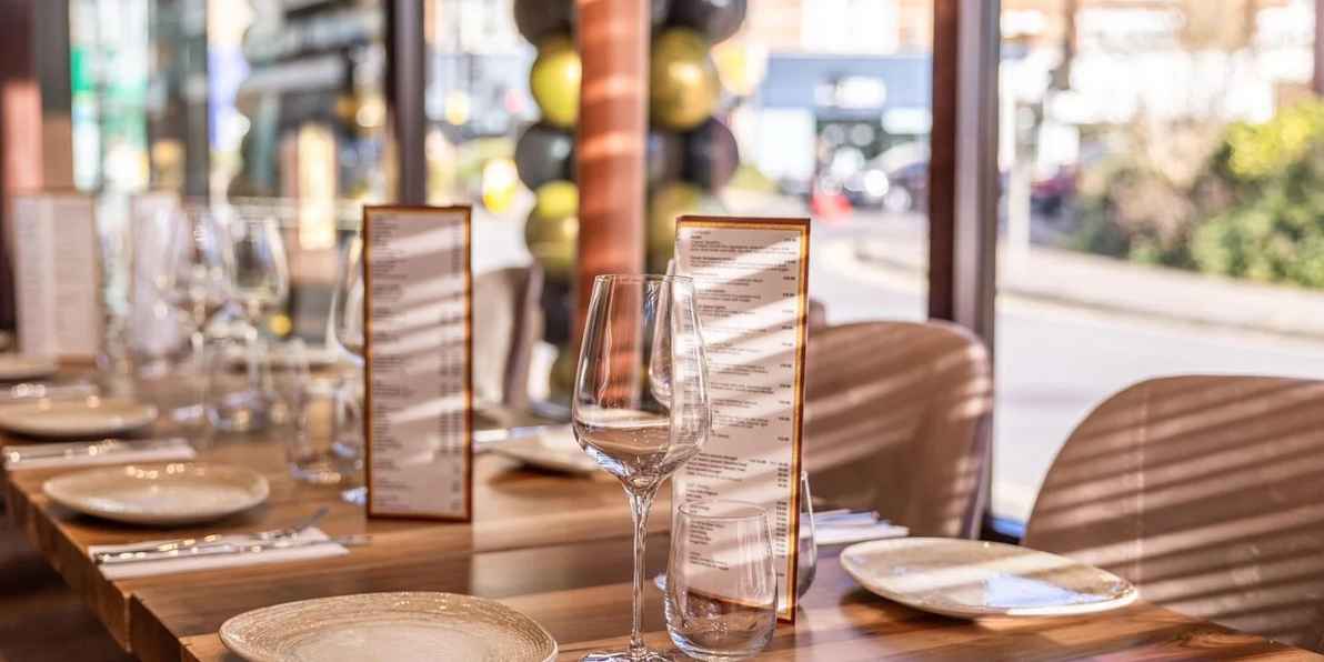 Aimer: 50% off the first table of the night with First Table