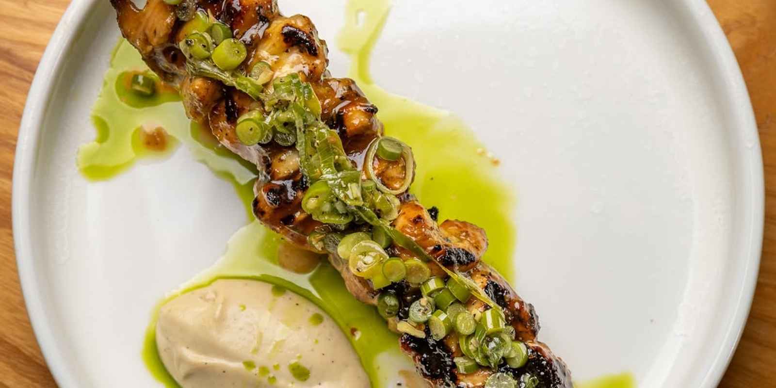 Nomad Bar Bistro & Woodfired Pizza