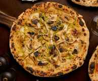 Nomad Bar Bistro & Woodfired Pizza